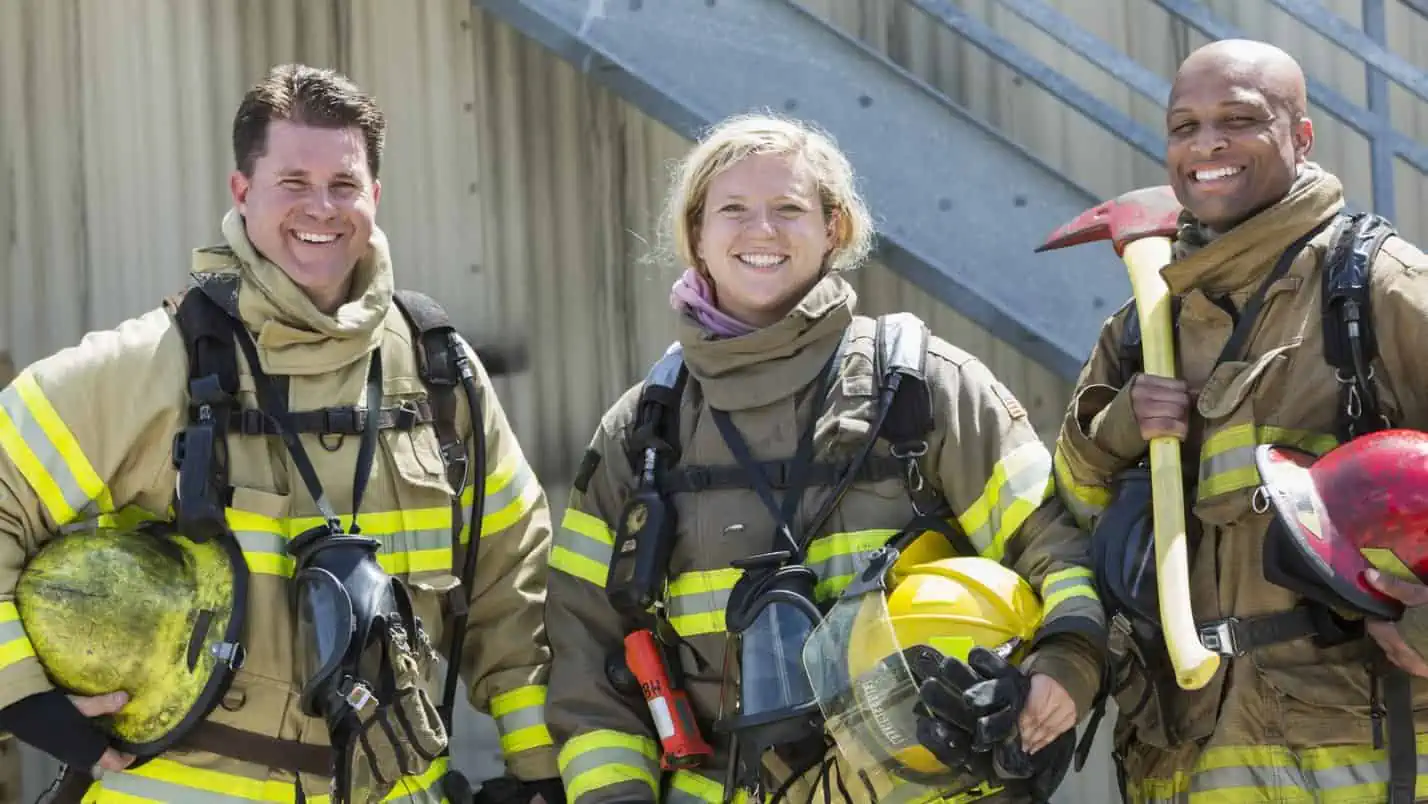 Pre-service firefighter program students in bunker gear at a Canadian fire academy